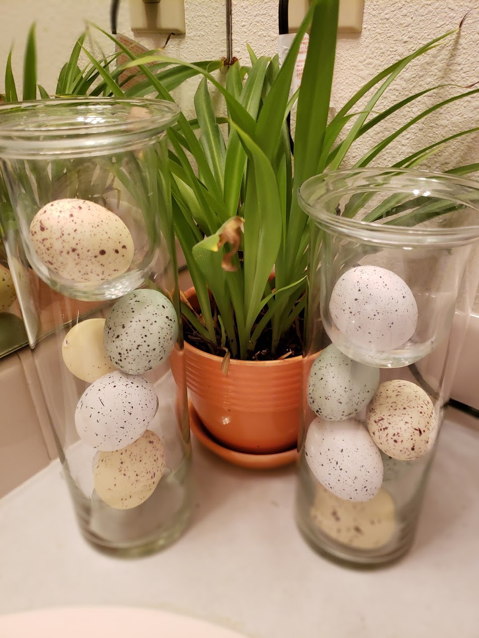 Two jars filled with natural looking eggs